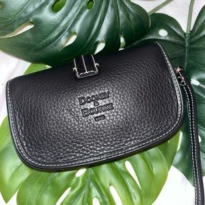 NWOT!! Dooney and Bourke black Flap Wristlet. Genuine leather